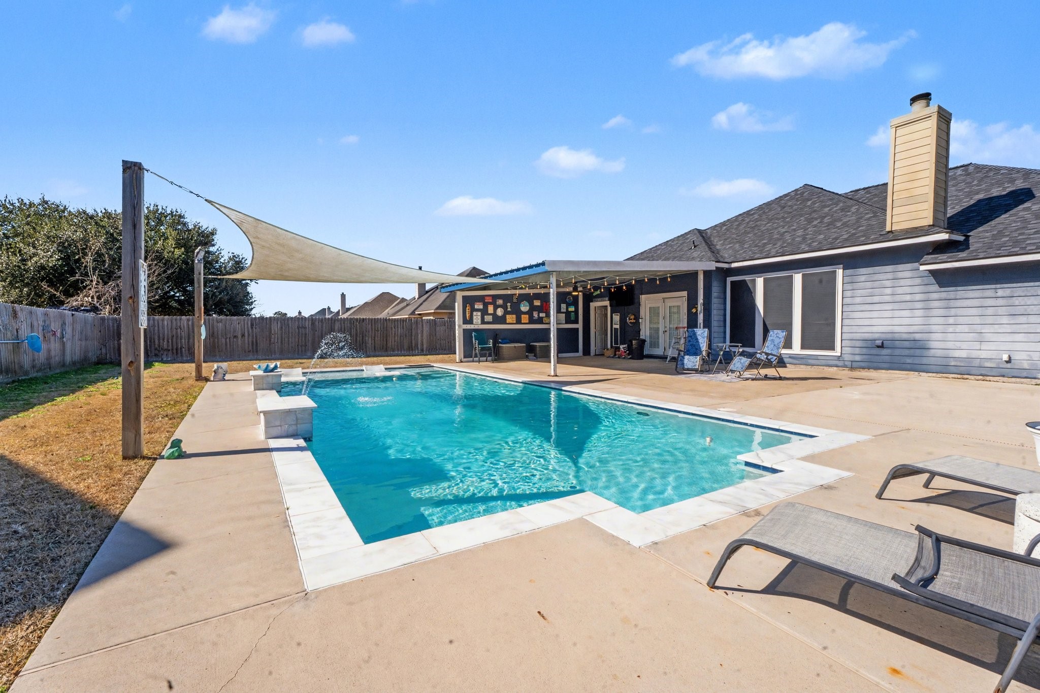 210 Milo Street Dayton, TX 77535 - Photo 19 of 24 Pool offers water fall & beach entrance