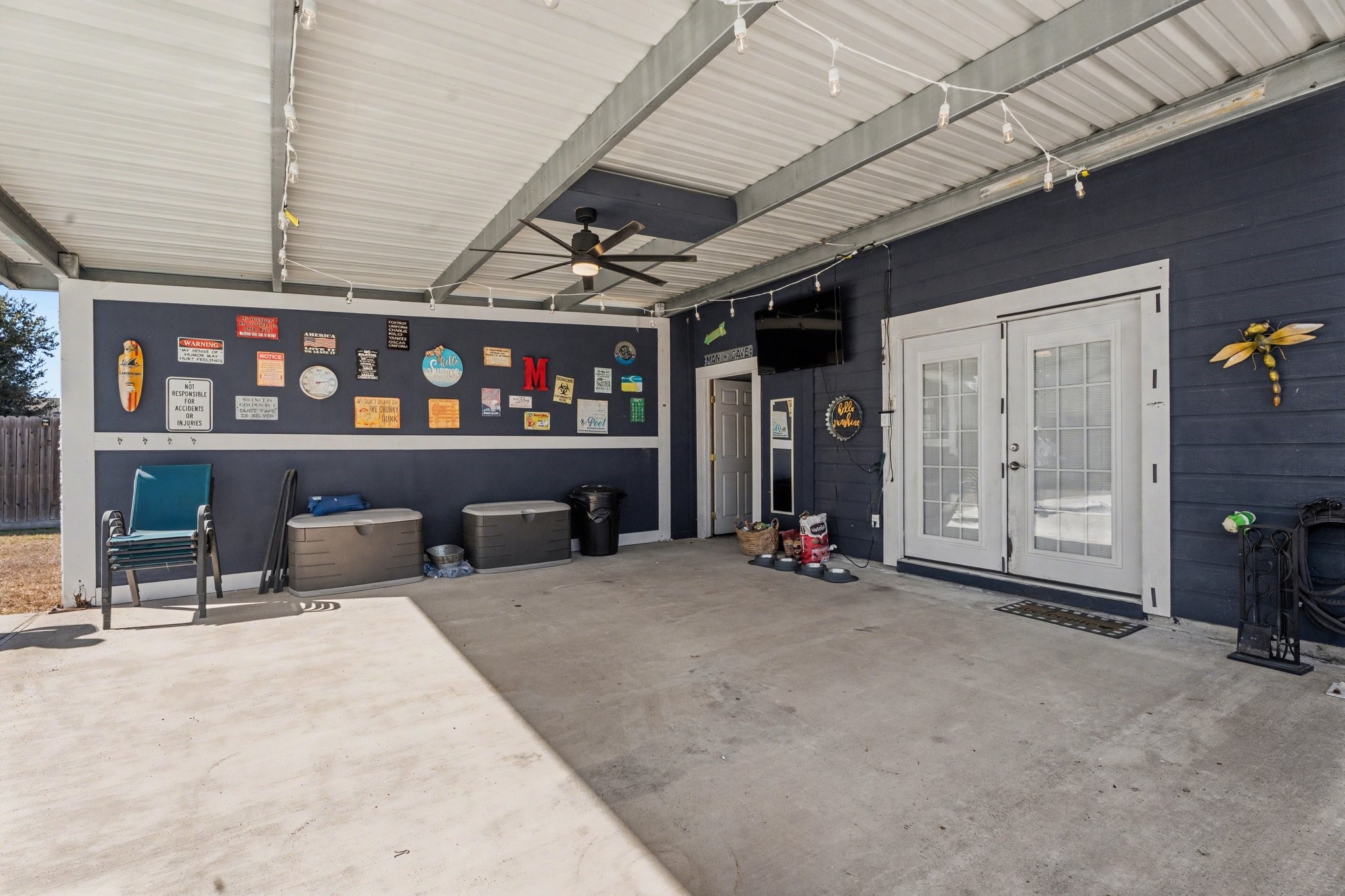 210 Milo Street Dayton, TX 77535 - Photo 23 of 24 Covered 16 X 20 Patio & Bonus storage room for pool toys