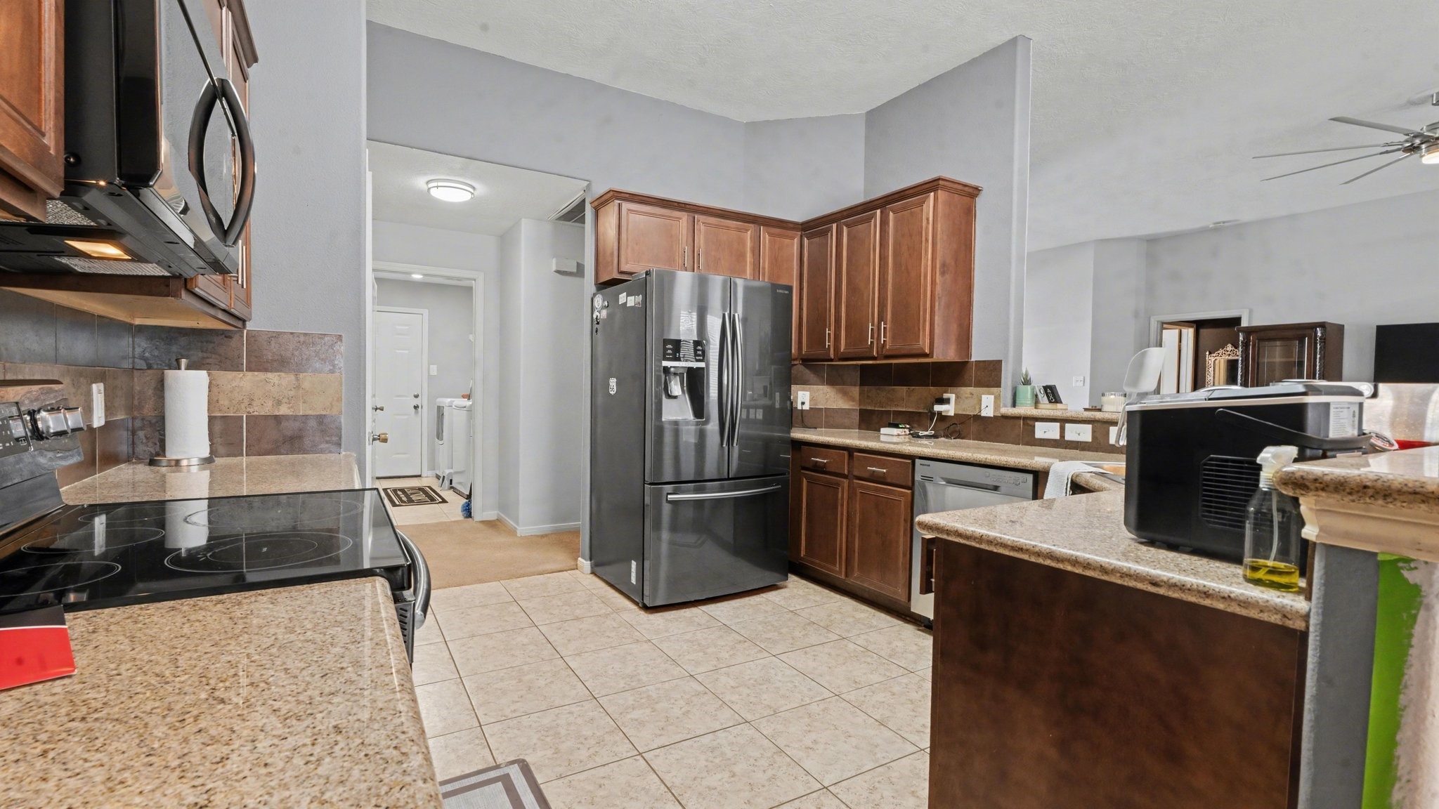 210 Milo Street Dayton, TX 77535 - Photo 8 of 24 Kitchen offers Granite countertops