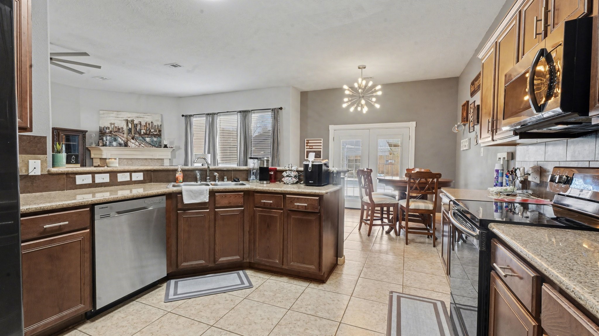 210 Milo Street Dayton, TX 77535 - Photo 9 of 24 Kitchen opens to Living room & Dining room