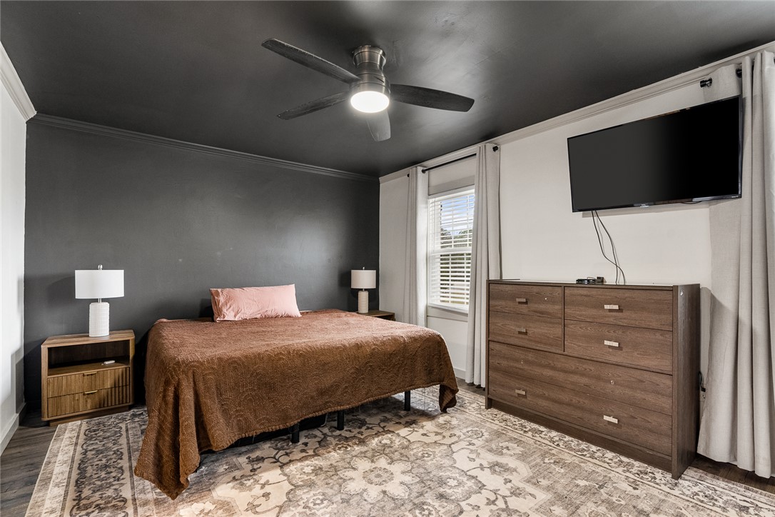 4508 Old Williamston Road Belton, SC 29627 - Photo 13 of 47 This serene bedroom offers comfort and style with elegant fixtures and a classic flooring.