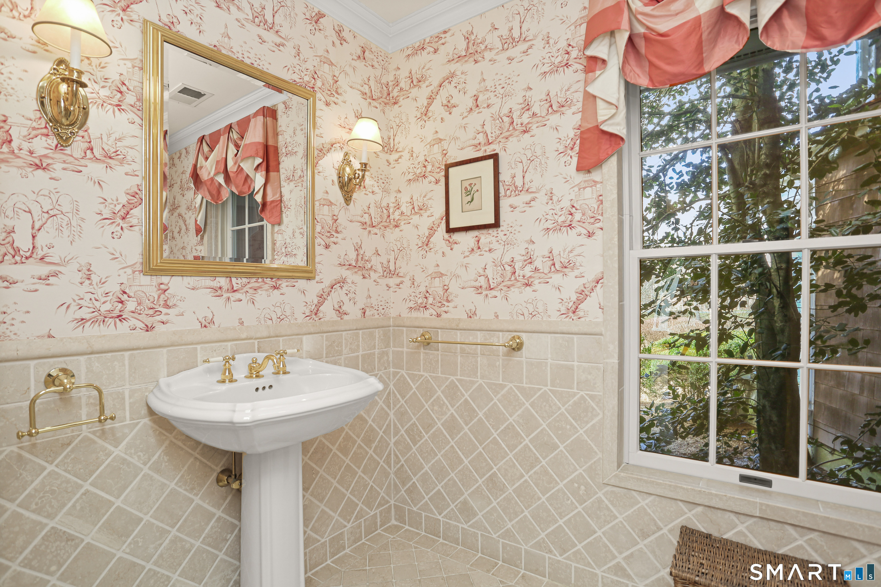 41 Lake Wind Road New Canaan, CT 06840 - Photo 12 of 38 a bathroom with a sink and a mirror
