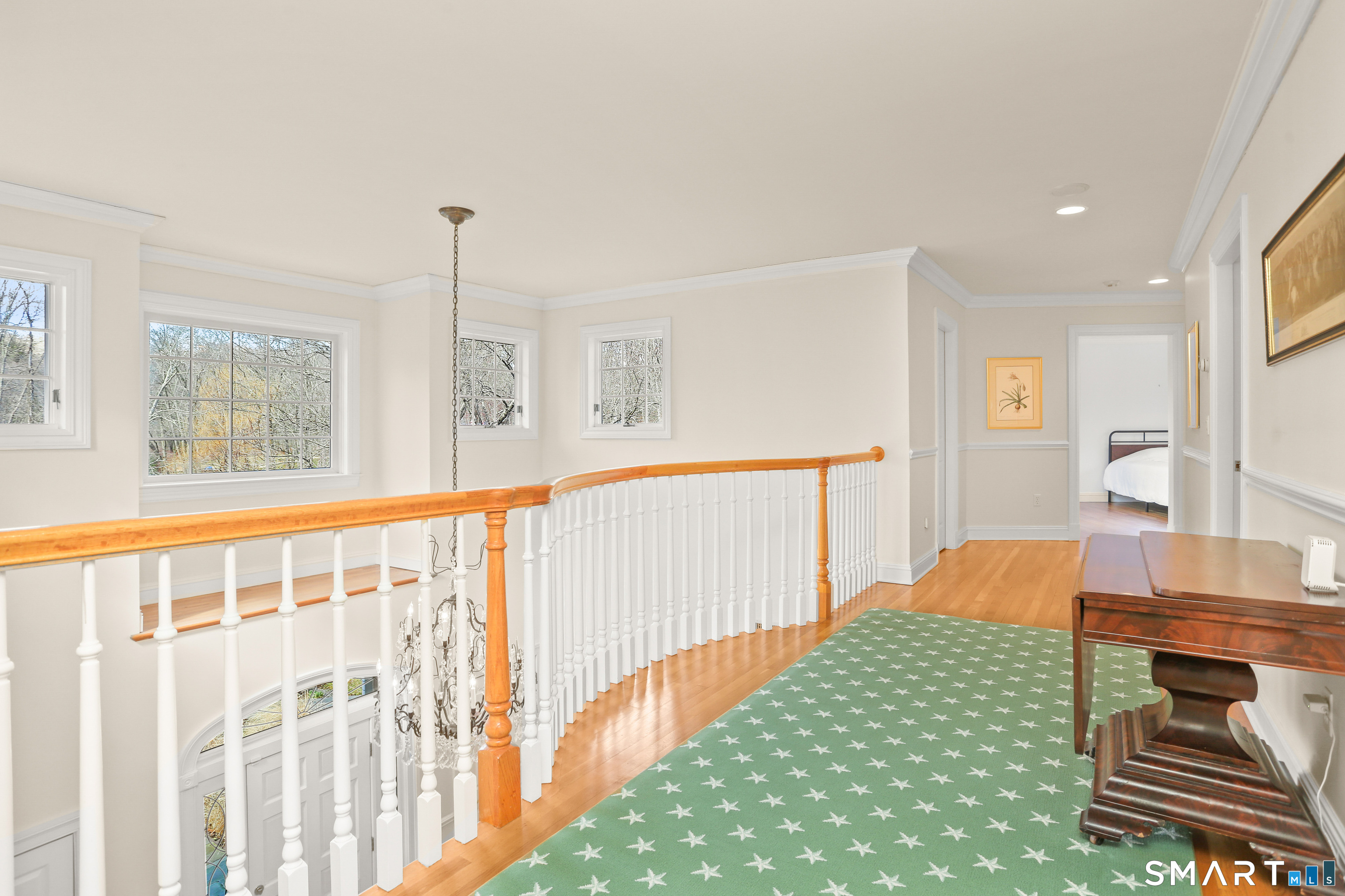 41 Lake Wind Road New Canaan, CT 06840 - Photo 24 of 38 a bedroom with furniture and a large window