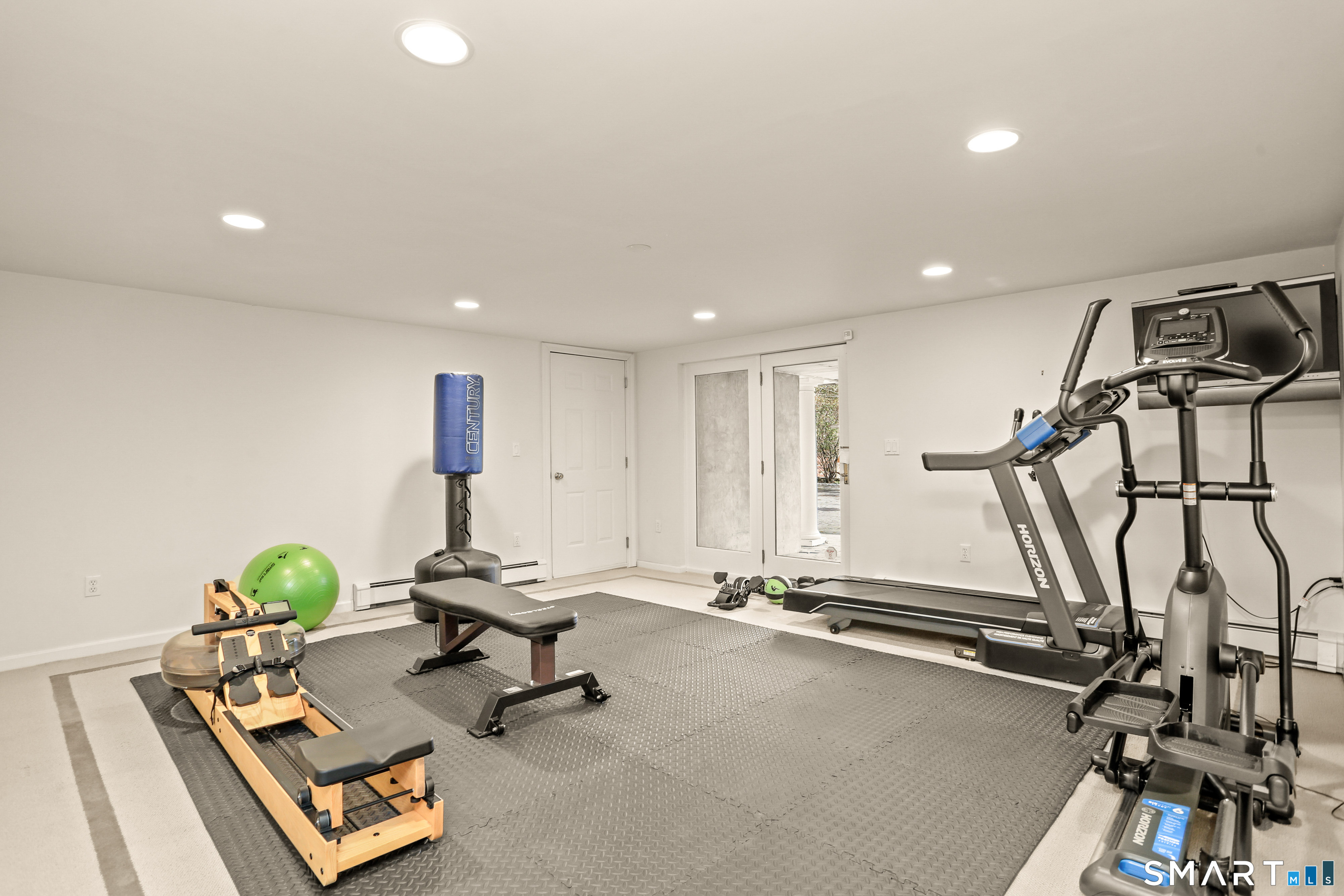 41 Lake Wind Road New Canaan, CT 06840 - Photo 26 of 38 a view of a room with gym equipment