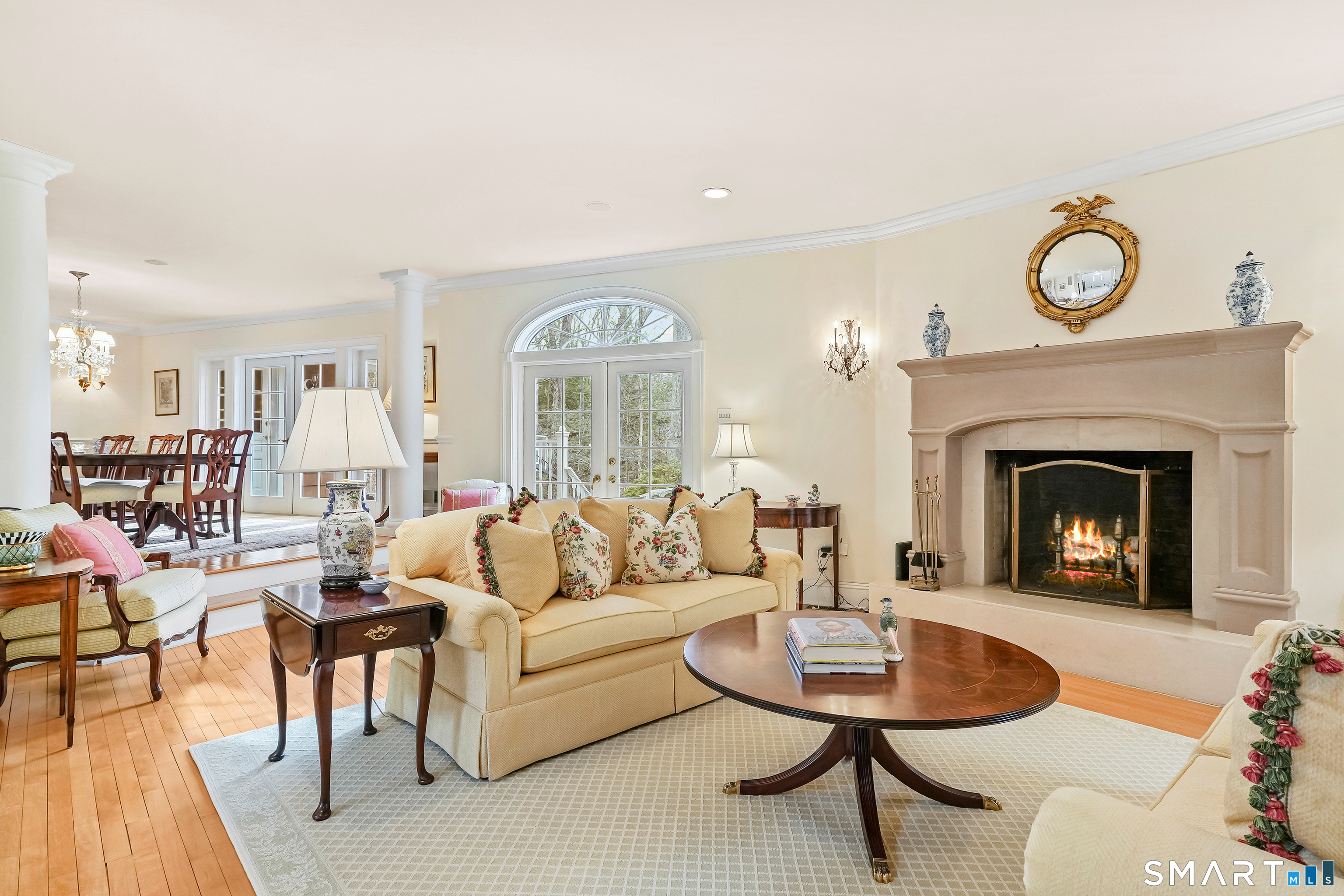 41 Lake Wind Road New Canaan, CT 06840 - Photo 4 of 38 a living room with furniture and a fireplace