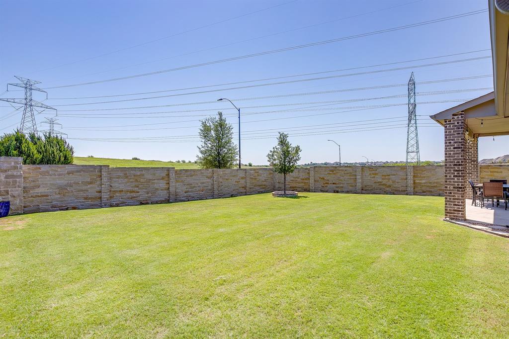 5709 Pope Creek Road Fort Worth, TX 76126 - Photo 37 of 39 This expansive backyard is perfect for kids to play or for building the pool of your dreams — endless possibilities!