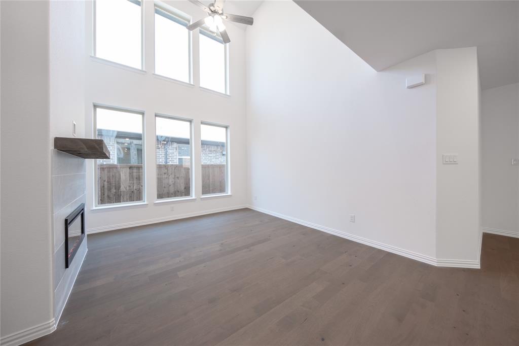 1413 Sun Gdn Way Justin, TX 76247 - Photo 10 of 36 a view of an empty room with a window