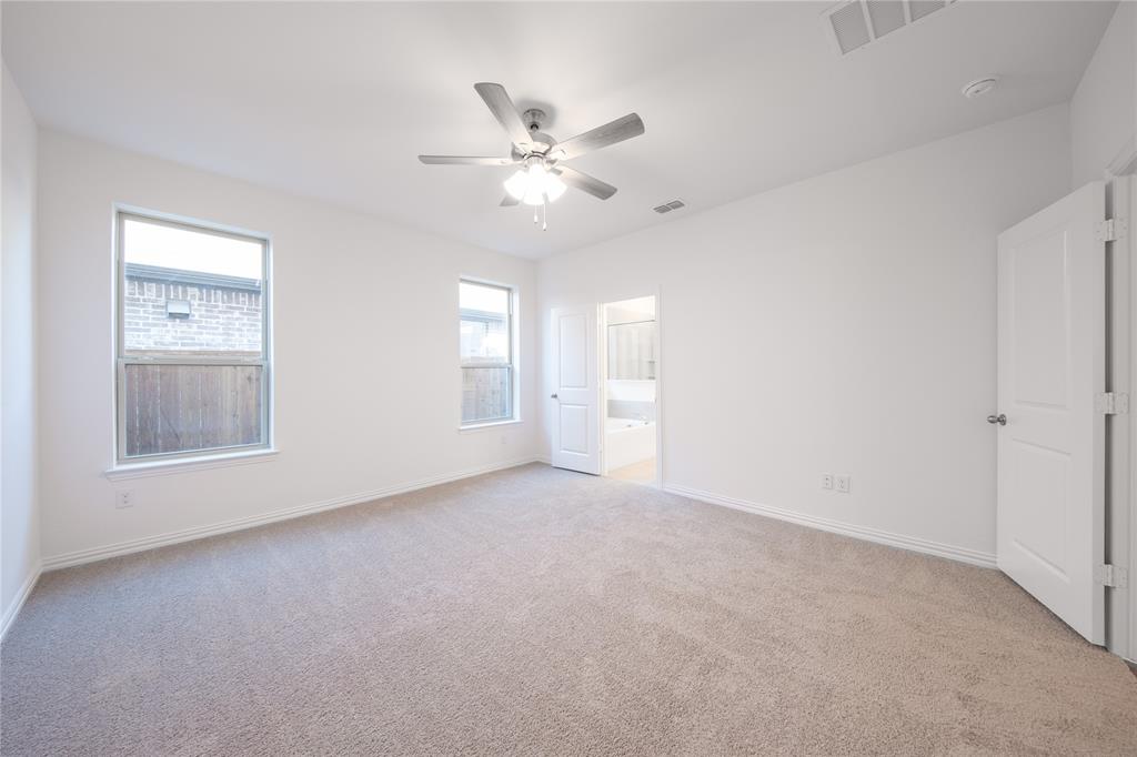 1413 Sun Gdn Way Justin, TX 76247 - Photo 15 of 36 a view of an empty room with a window