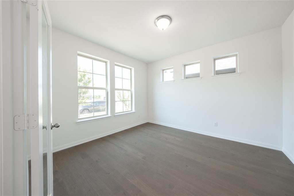 1413 Sun Gdn Way Justin, TX 76247 - Photo 20 of 36 an empty room with a window