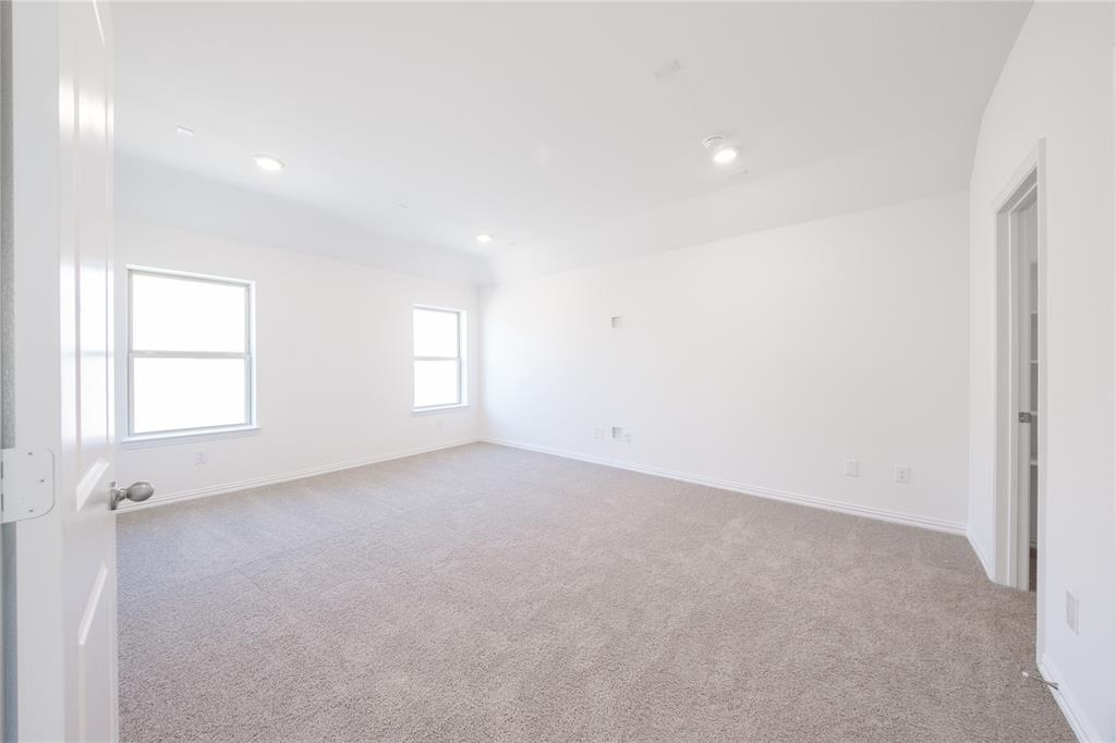 1413 Sun Gdn Way Justin, TX 76247 - Photo 22 of 36 an empty room with windows