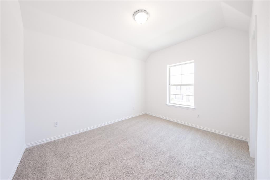 1413 Sun Gdn Way Justin, TX 76247 - Photo 24 of 36 a view of an empty room with a window