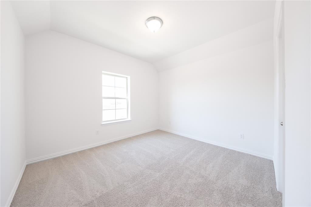 1413 Sun Gdn Way Justin, TX 76247 - Photo 27 of 36 a view of an empty room with a window
