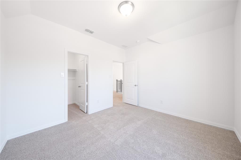 1413 Sun Gdn Way Justin, TX 76247 - Photo 28 of 36 a view of a room with an empty space