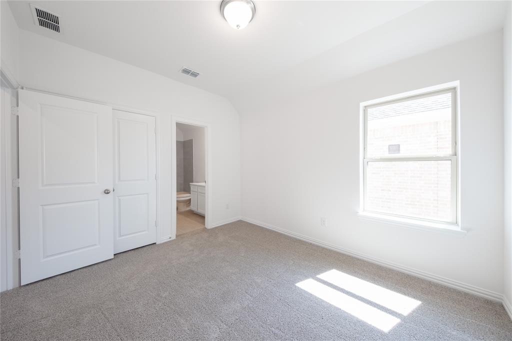 1413 Sun Gdn Way Justin, TX 76247 - Photo 31 of 36 an empty room with windows