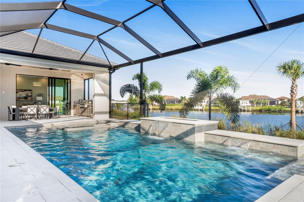 1621 Rio Vista Terrace Parrish, FL 34219 - Photo 25 of 27 a view of a swimming pool with a patio