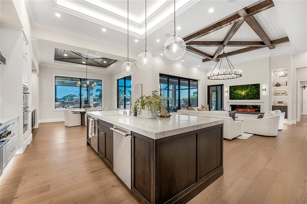 1621 Rio Vista Terrace Parrish, FL 34219 - Photo 9 of 27 a kitchen with stainless steel appliances granite countertop a sink and a stove