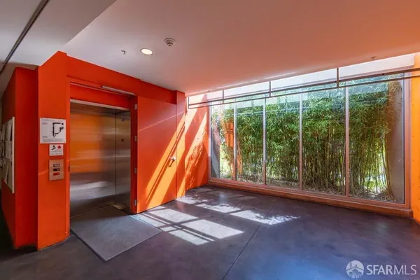 a view of a hallway with a elevator