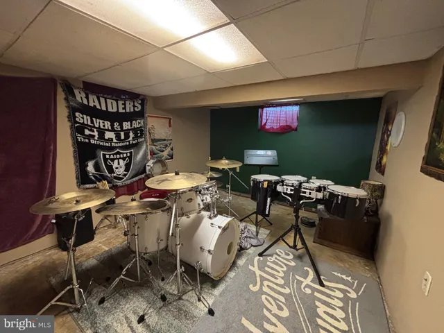 a bathroom with a double vanity sink and a toilet