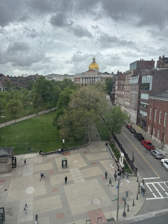 47 Winter Street, Unit 601 Boston, MA 02108 - Photo 12 of 12 a view of a city with tall buildings