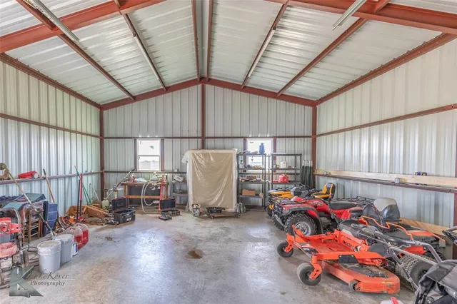 a storage room with lots of white furniture