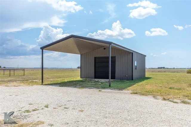 a view of a backyard of a house