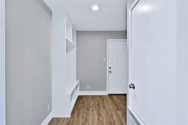 a view of bathroom with a sink and a mirror