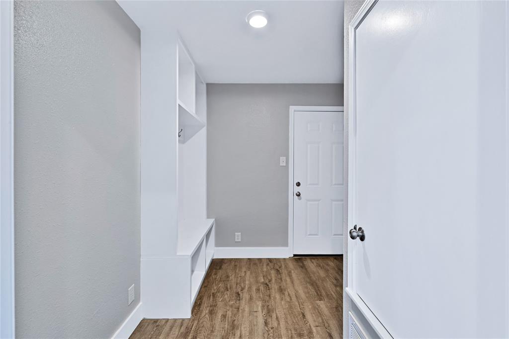 566 McCraw Lane Denison, TX 75021 - Photo 20 of 25 a view of bathroom with a sink and a mirror
