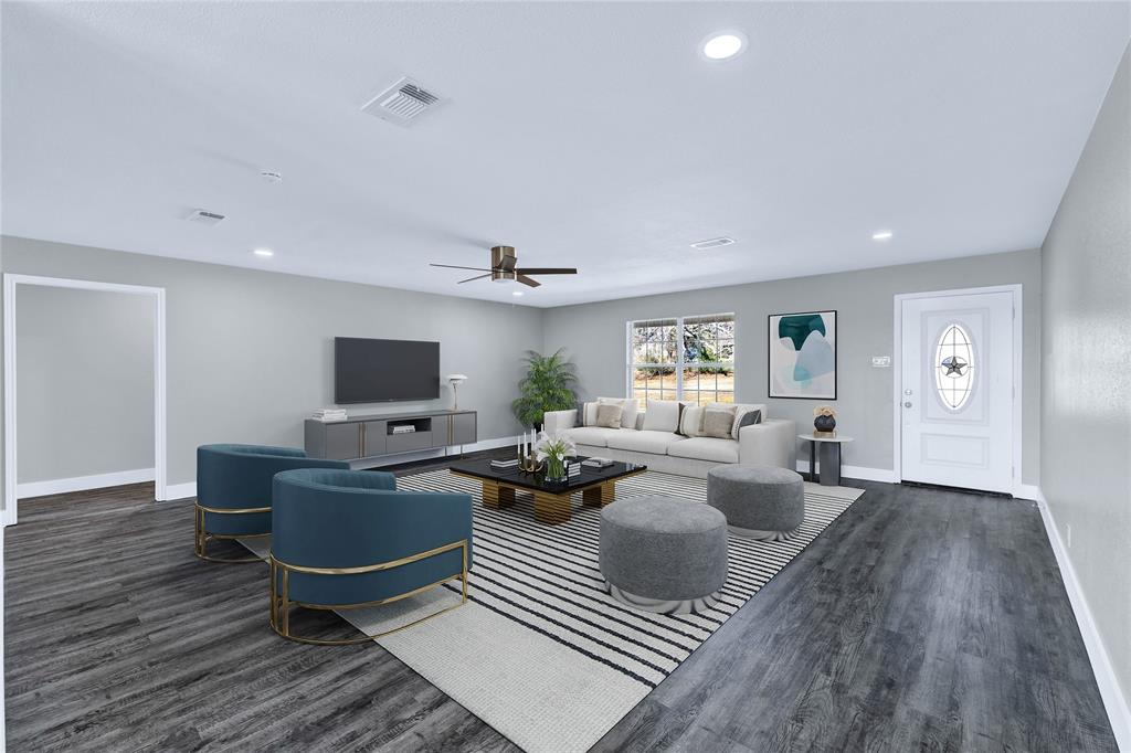 566 McCraw Lane Denison, TX 75021 - Photo 3 of 25 a living room with furniture wooden floor and a flat screen tv
