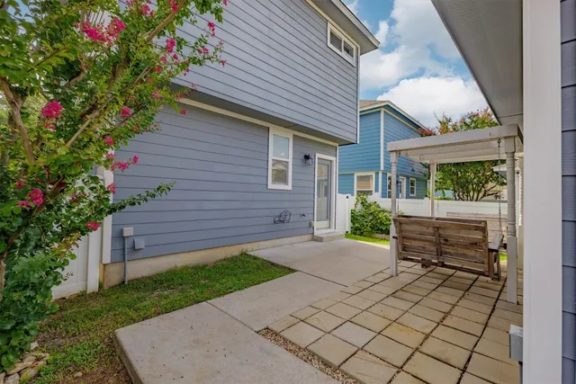 a backyard of a house with lots of green space
