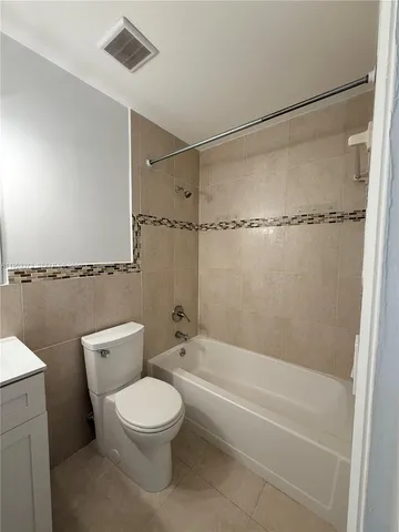 a view of kitchen and utility room