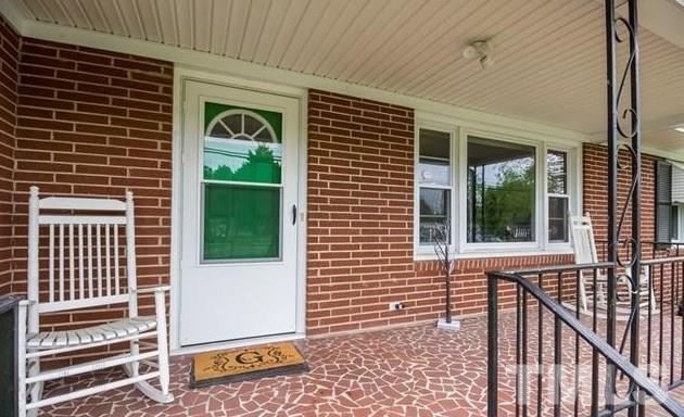 70 Spring Valley Road Henderson, NC 27537 - Photo 3 of 14 a view of a door and a window