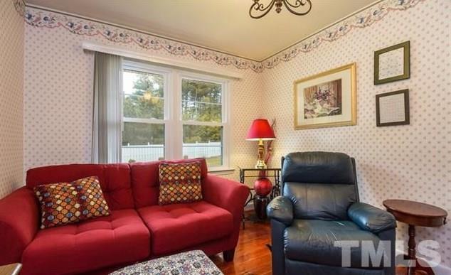 70 Spring Valley Road Henderson, NC 27537 - Photo 6 of 14 a living room with furniture and a window