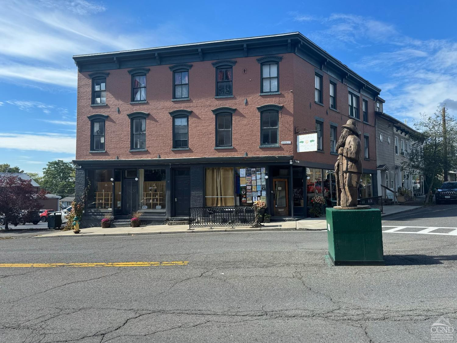 a front view of a building with street