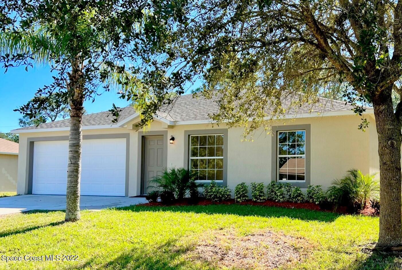 718 Andrew Street Southeast Palm Bay, FL 32909 - Photo 2 of 11 Exterior Front