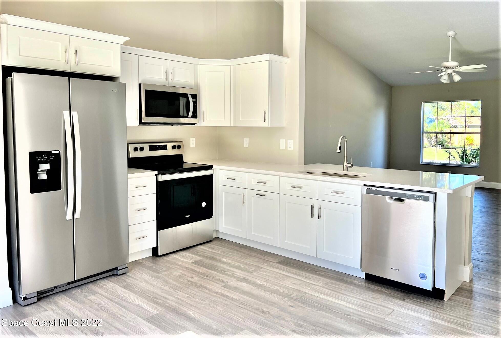 718 Andrew Street Southeast Palm Bay, FL 32909 - Photo 5 of 11 Kitchen (2)