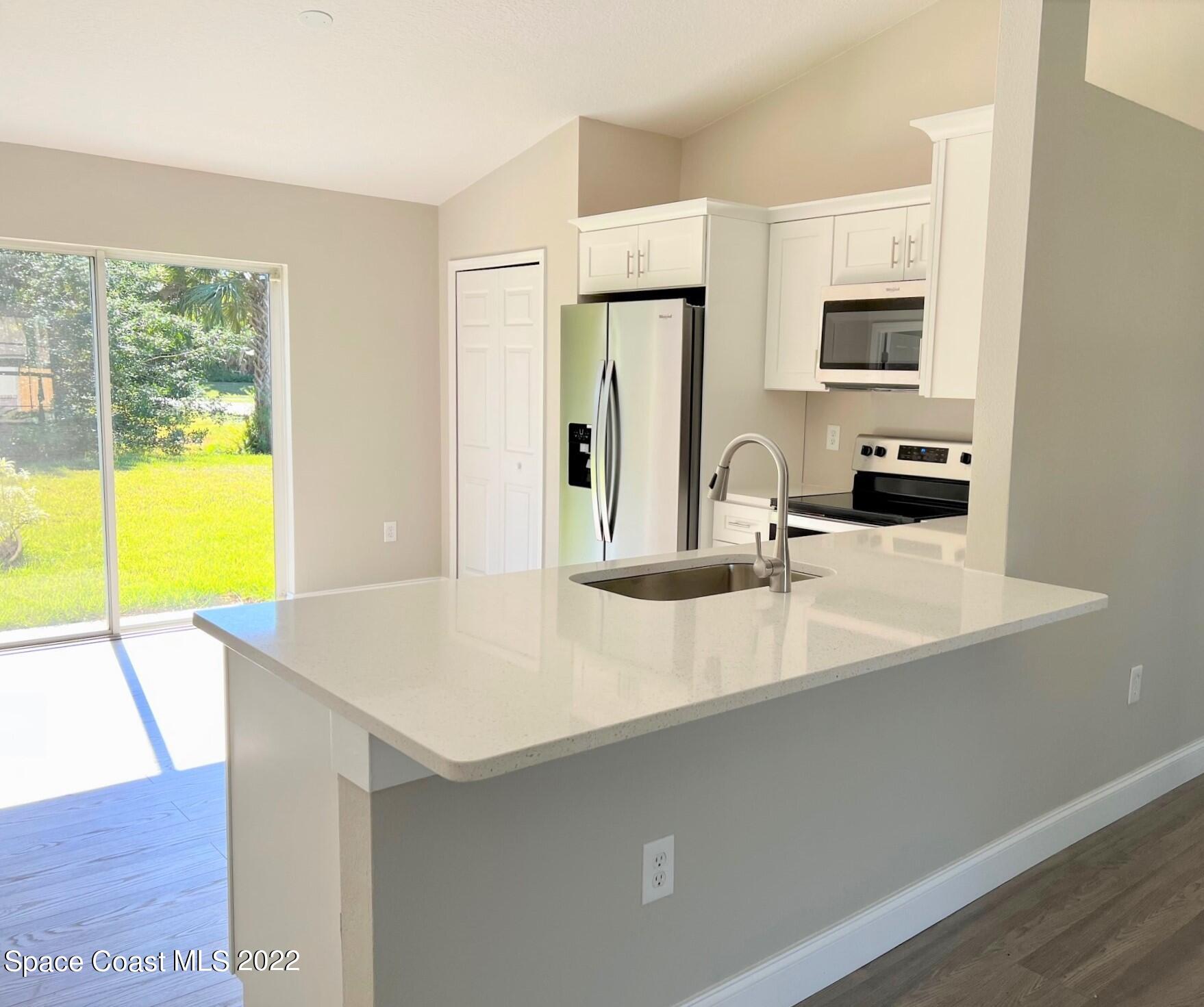 718 Andrew Street Southeast Palm Bay, FL 32909 - Photo 6 of 11 Kitchen
