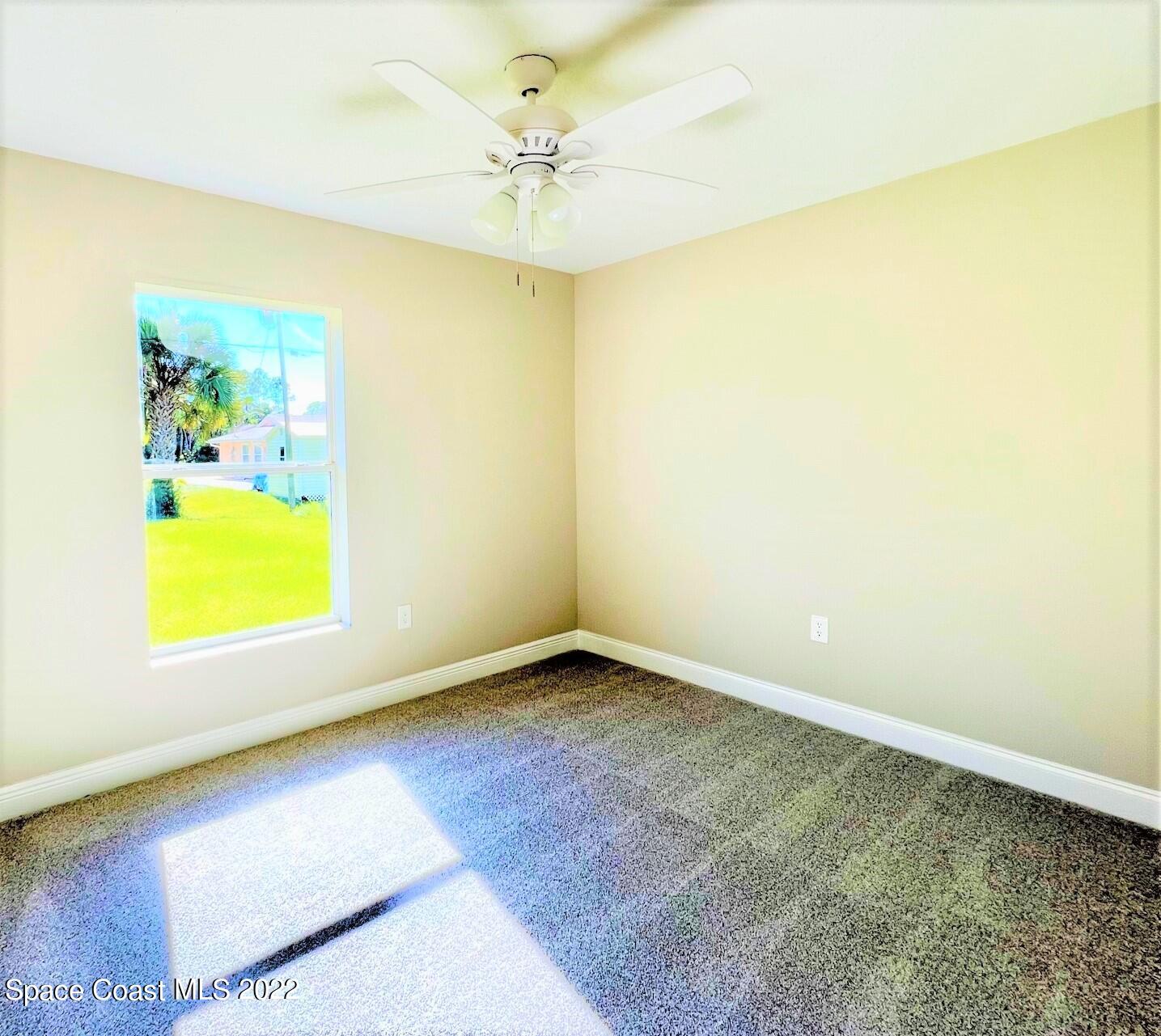 718 Andrew Street Southeast Palm Bay, FL 32909 - Photo 10 of 11 Bedroom 2