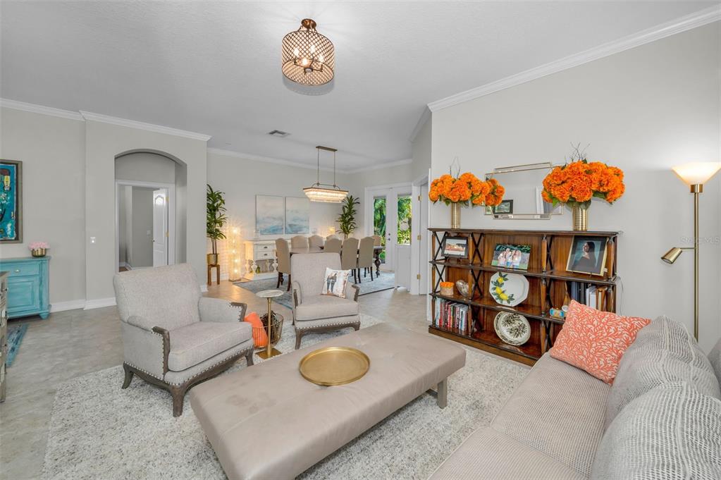 9952 Sago Point Drive Largo, FL 33777 - Photo 11 of 44 a living room with furniture and a couch