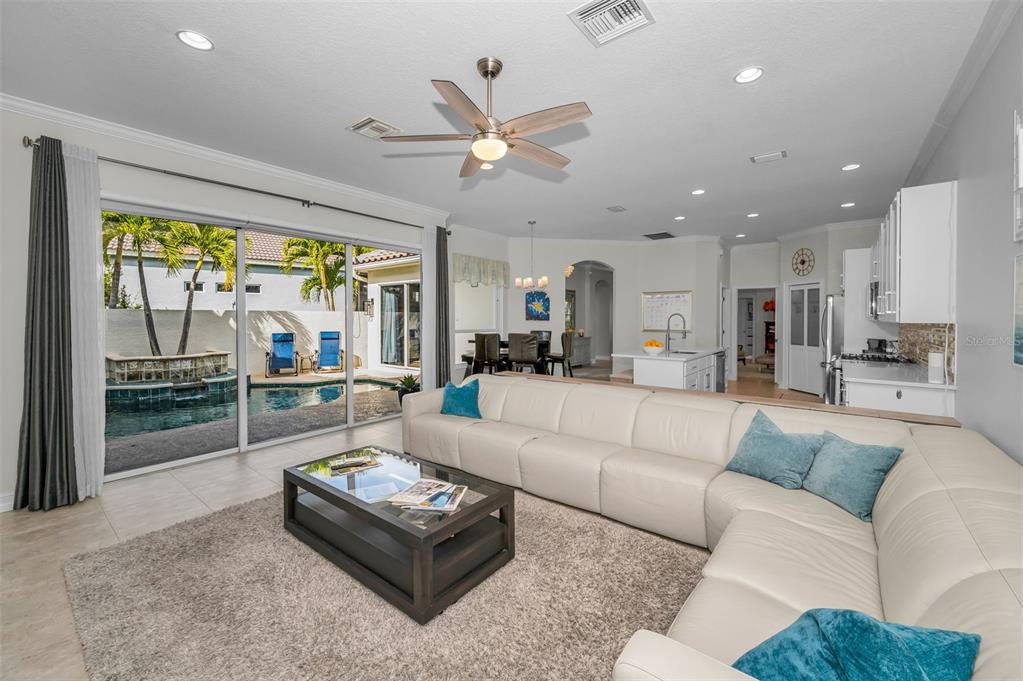 9952 Sago Point Drive Largo, FL 33777 - Photo 17 of 44 a living room with furniture and a large window