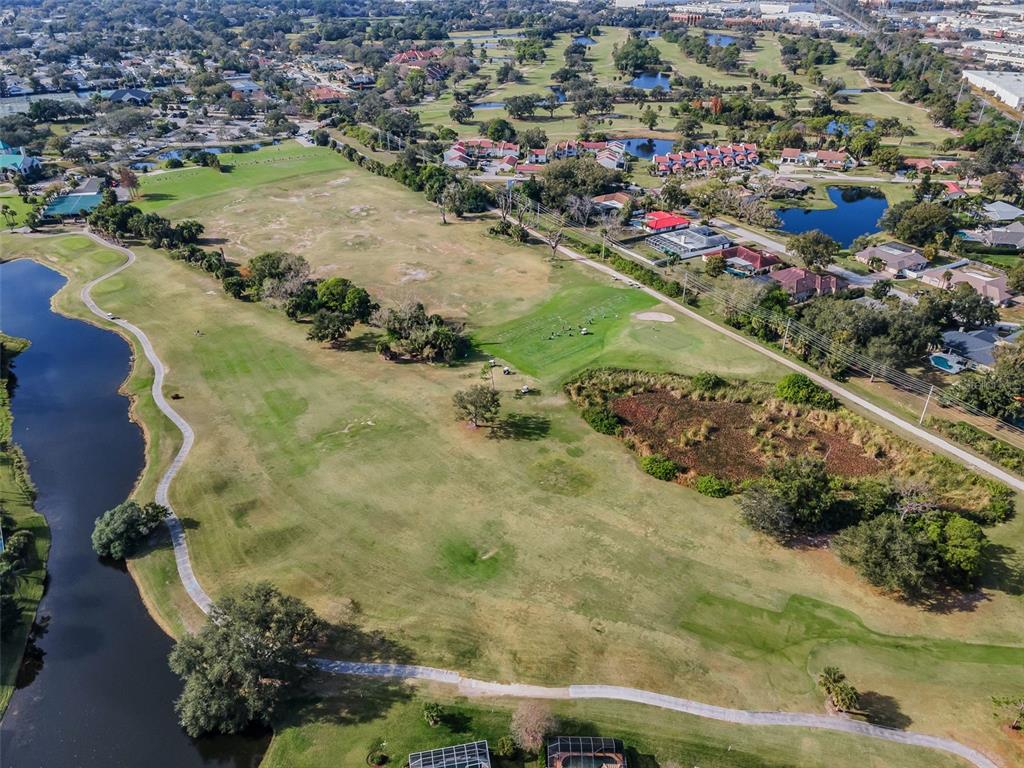 9952 Sago Point Drive Largo, FL 33777 - Photo 36 of 44 an aerial view of a houses with outdoor space