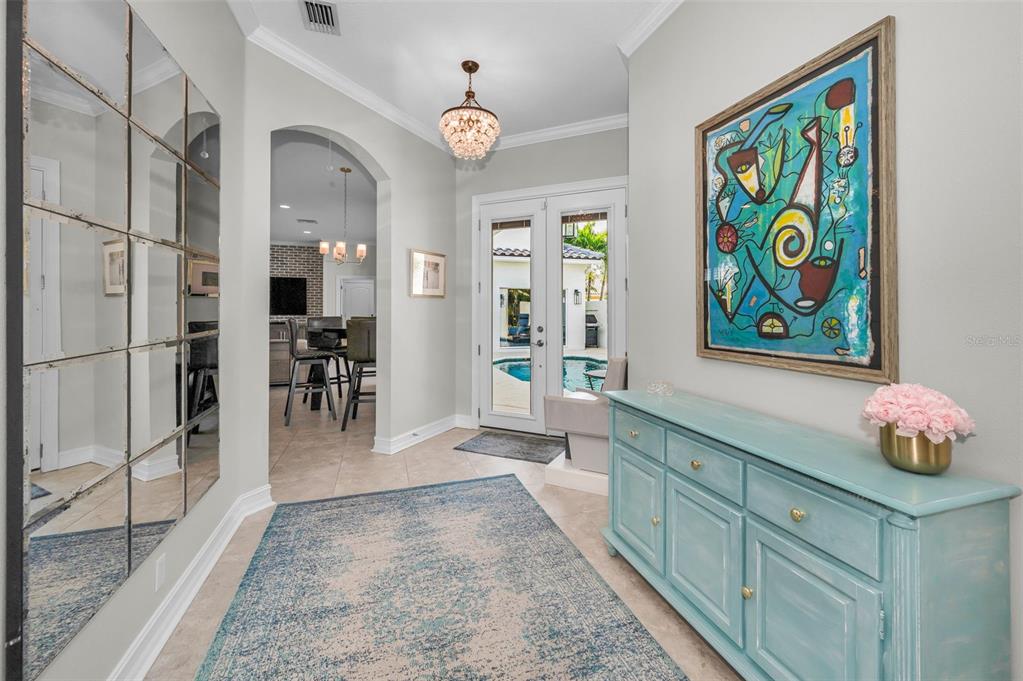 9952 Sago Point Drive Largo, FL 33777 - Photo 5 of 44 a view of kitchen with furniture and flat screen tv