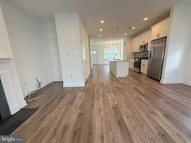a view of a balcony with wooden floor
