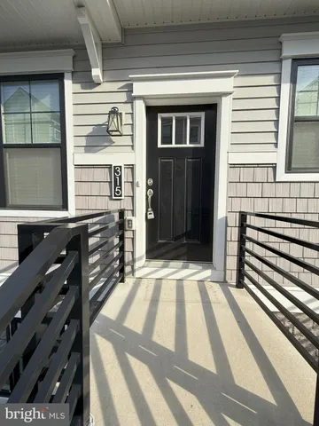 a view of a balcony and front door