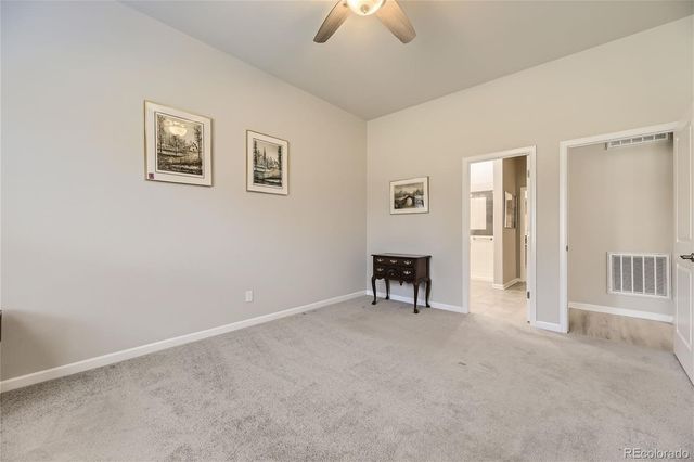 a spacious bathroom with a double vanity sink mirror and double
