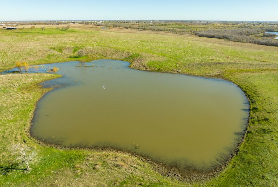 5 County Road 419 Taylor, TX 76574 - Photo 6 of 10 a view of an ocean from a balcony