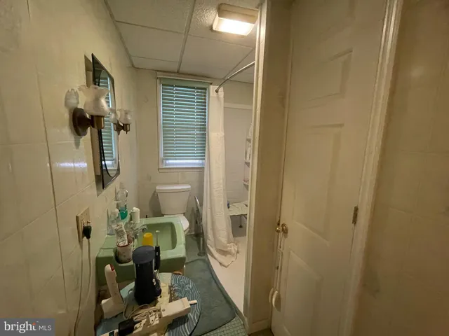 a bathroom with a mirror