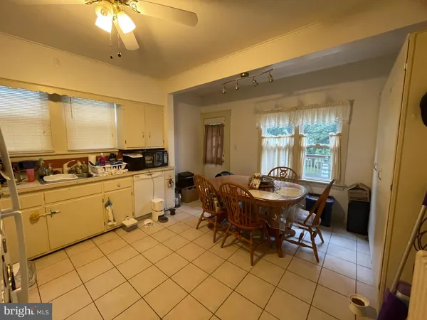 a view of a open dining room with furniture