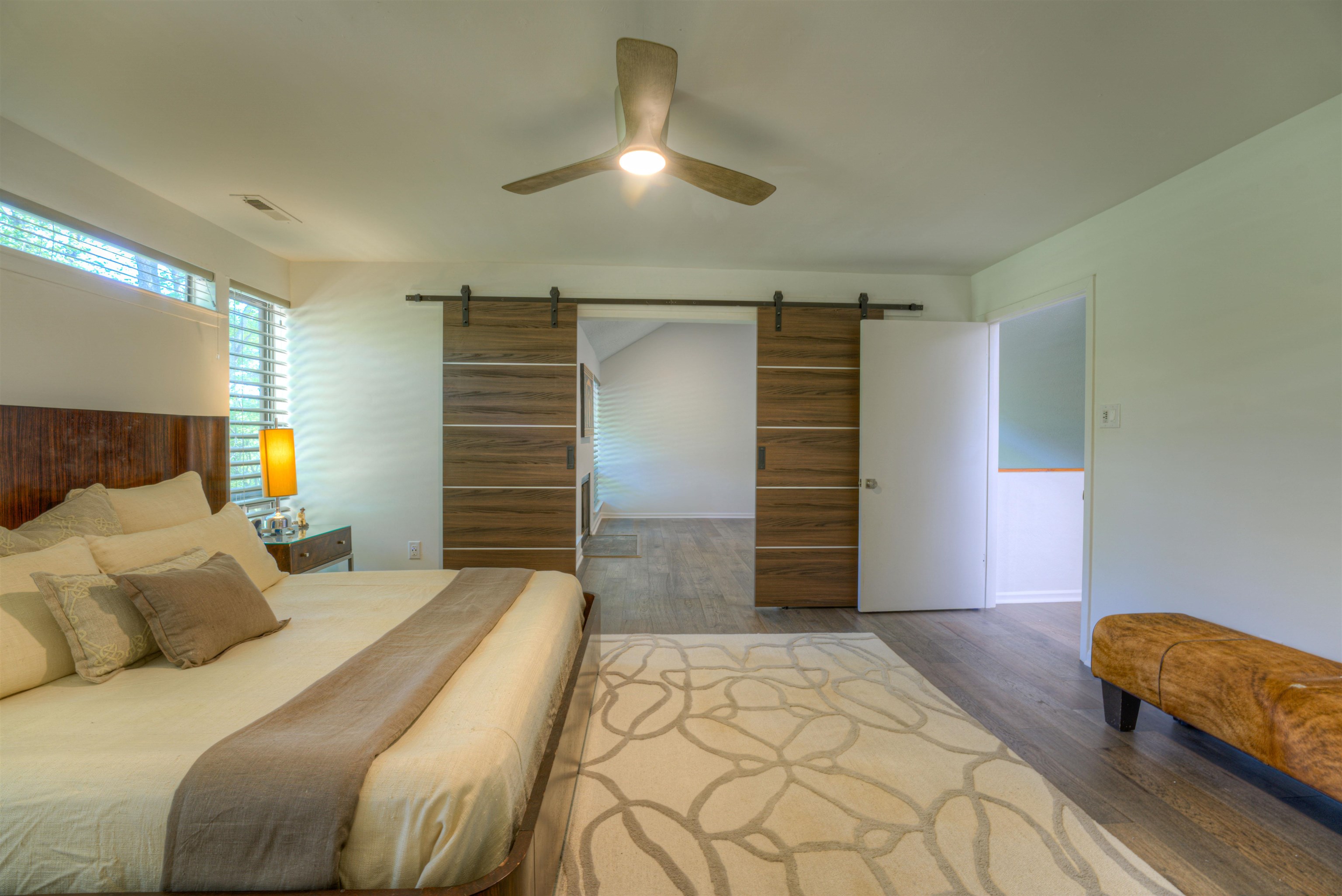 6921 Tangleberry Cove Memphis, TN 38119 - Photo 18 of 39 a bedroom with a bed and a ceiling fan