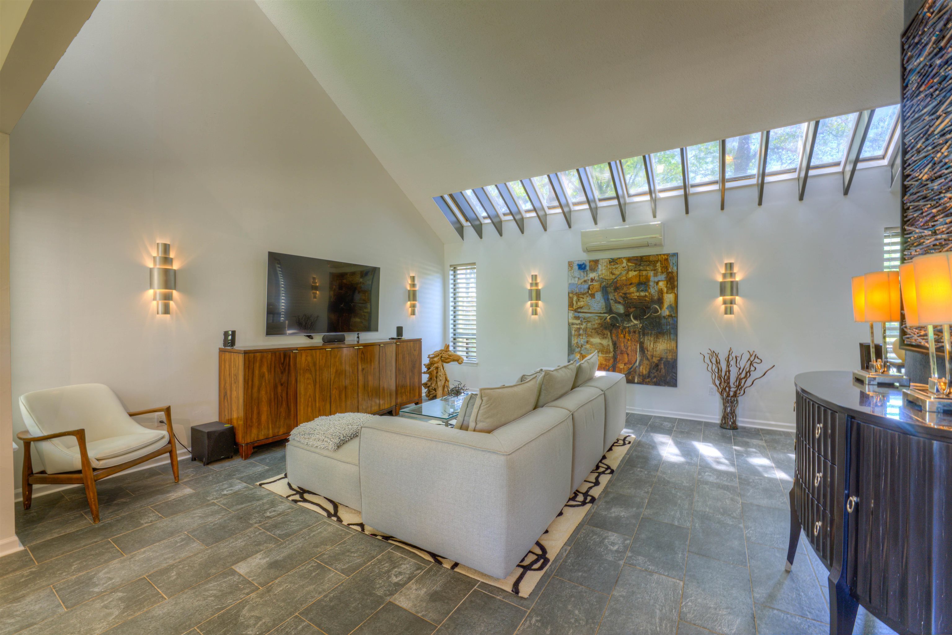 6921 Tangleberry Cove Memphis, TN 38119 - Photo 2 of 39 a living room with furniture and a flat screen tv