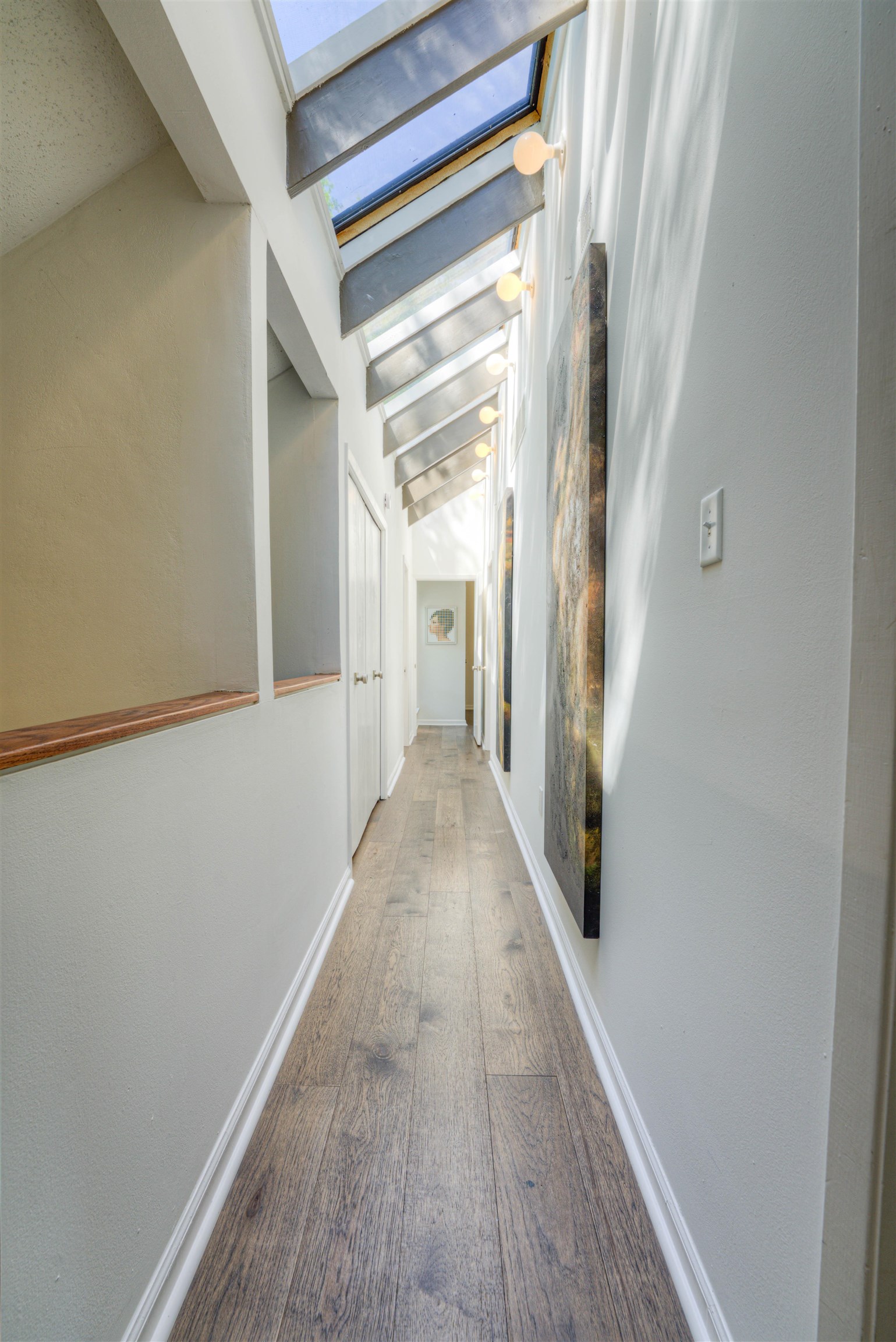 6921 Tangleberry Cove Memphis, TN 38119 - Photo 24 of 39 a view of a hallway with wooden floor